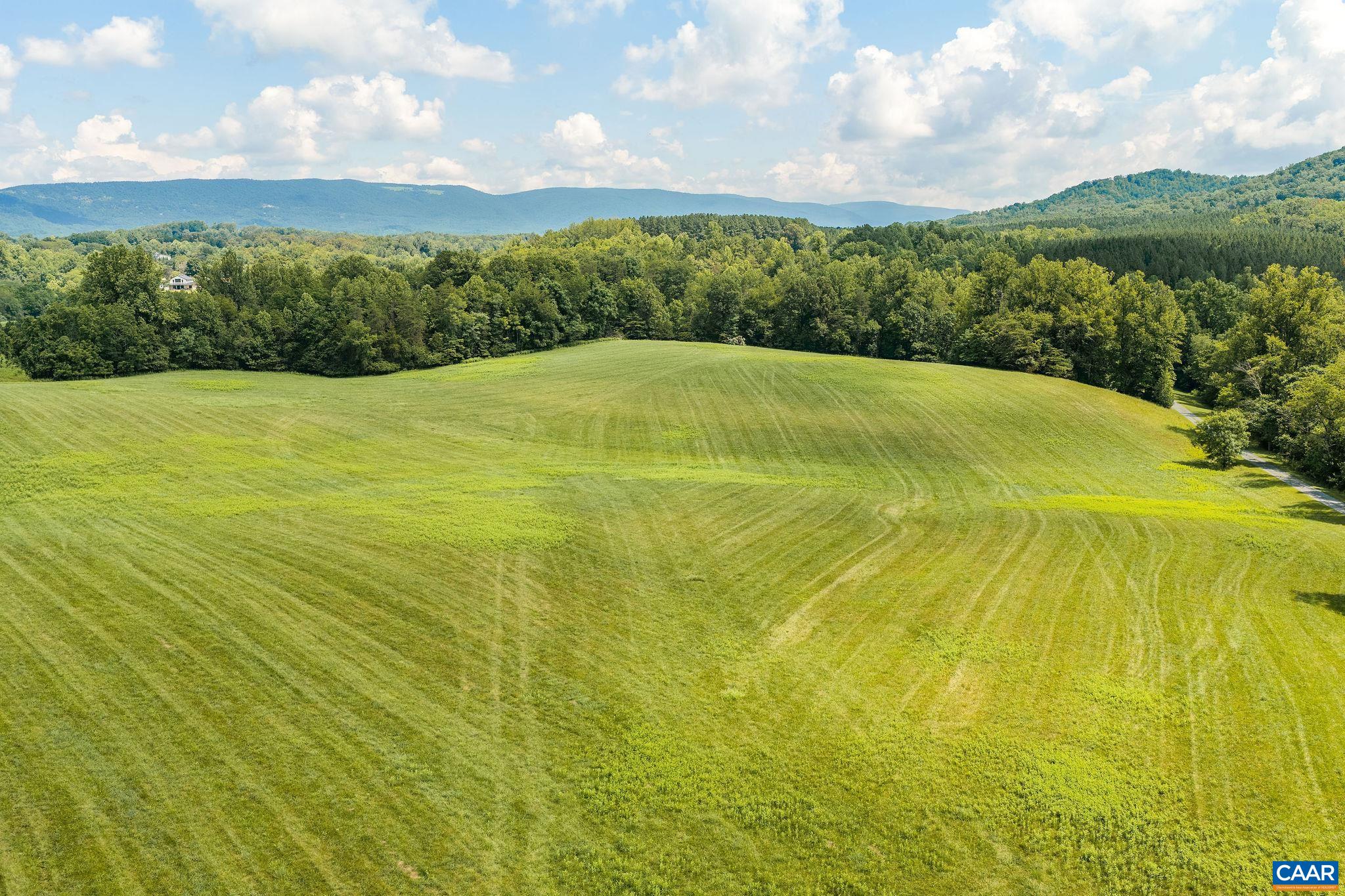 Photo taken from 1 of 2 existing entrances to the farm.  However this parcel for Homesite 1 and parcel for Homesite 2 can both have private entrances directly off of Route 151.