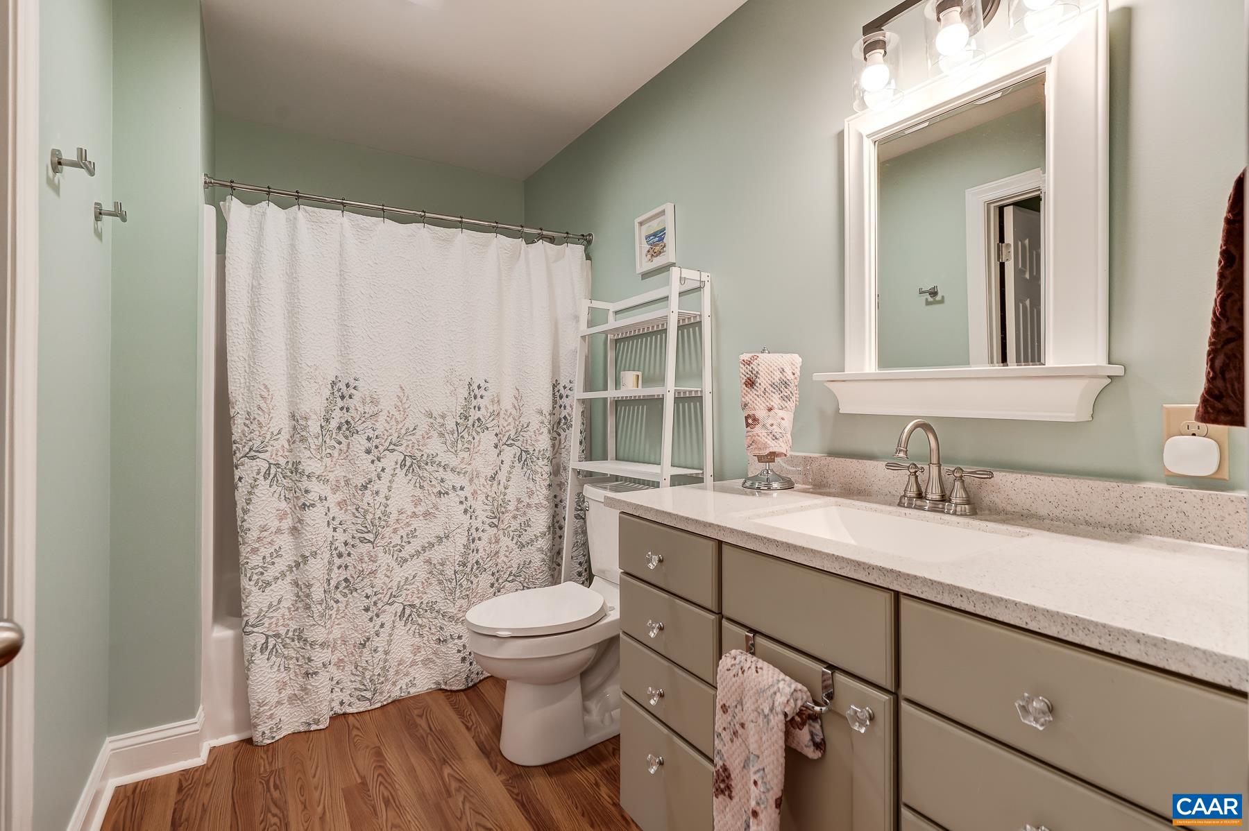 Full hall bathroom with tub/shower combo. Full hall bathroom with tub/shower combo.
