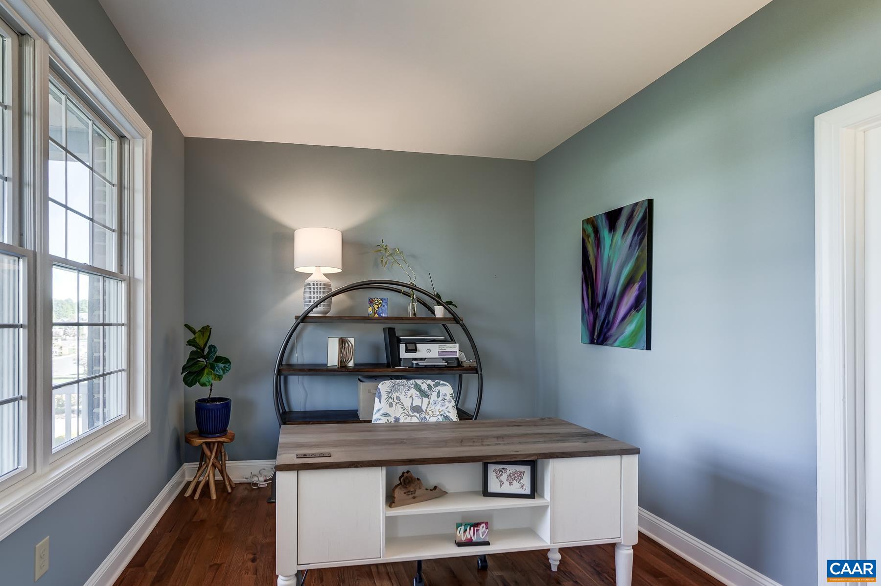 Home office at the front of the home features large walk-in closet and could be a fifth bedroom. Home office at the front of the home features large walk-in closet and could be a fifth bedroom.