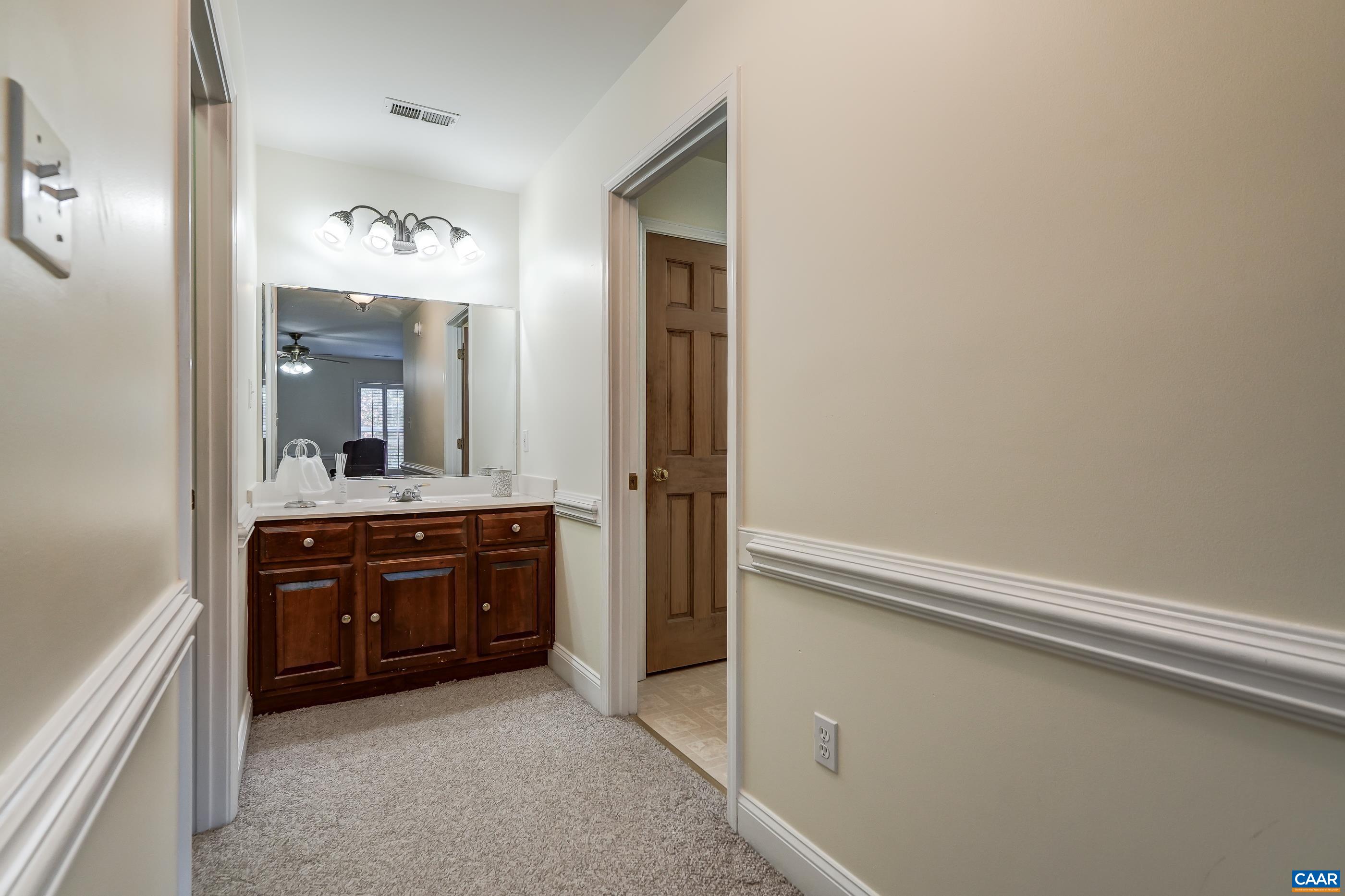 Dressing area with vanity. Dressing area with vanity.
