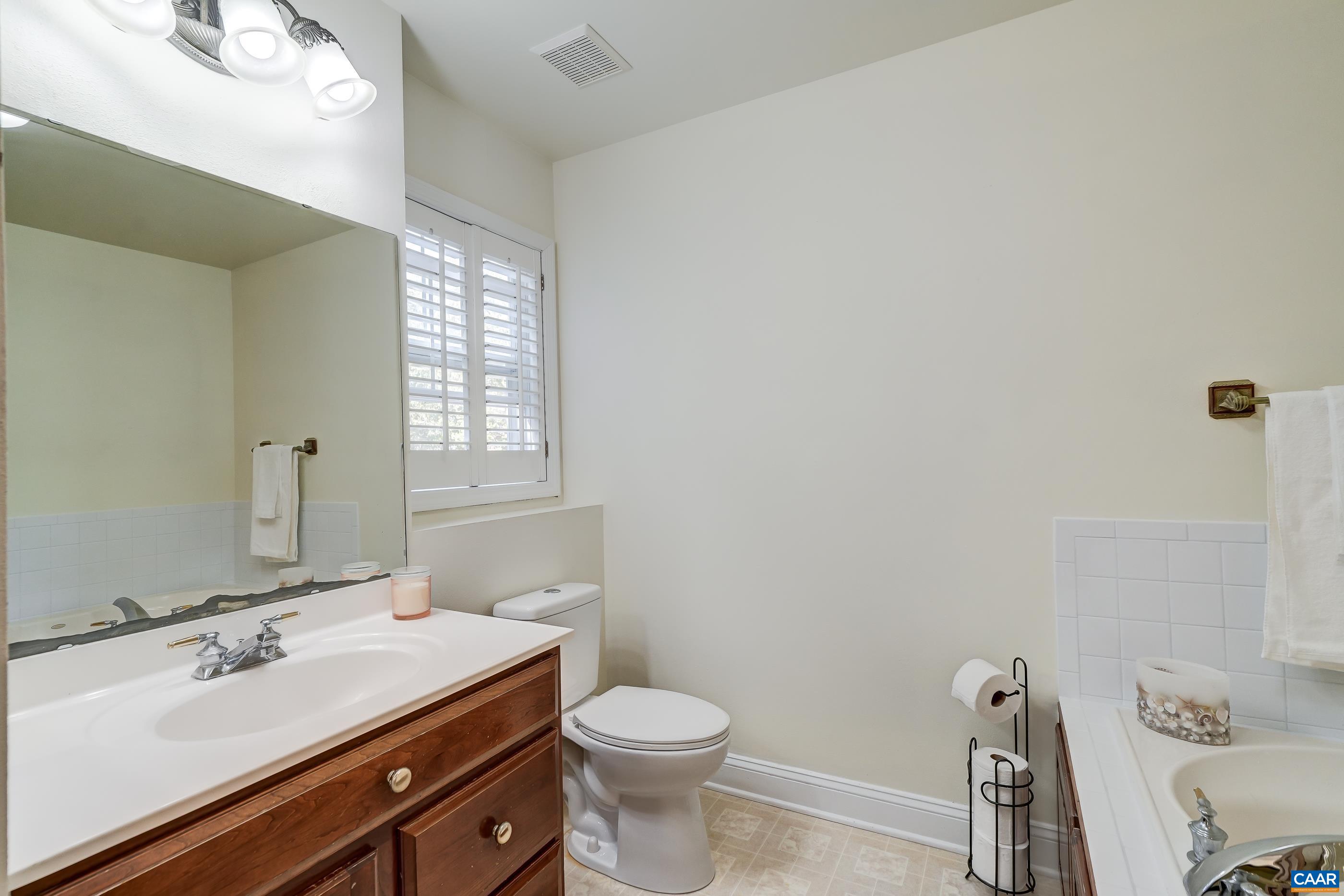 Primary bathroom with second vanity. Primary bathroom with second vanity.