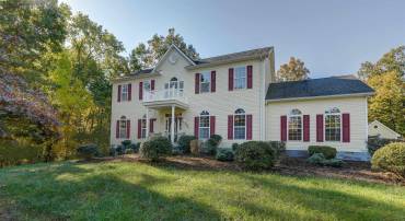 Country living in this charming home on 2.2  acres!