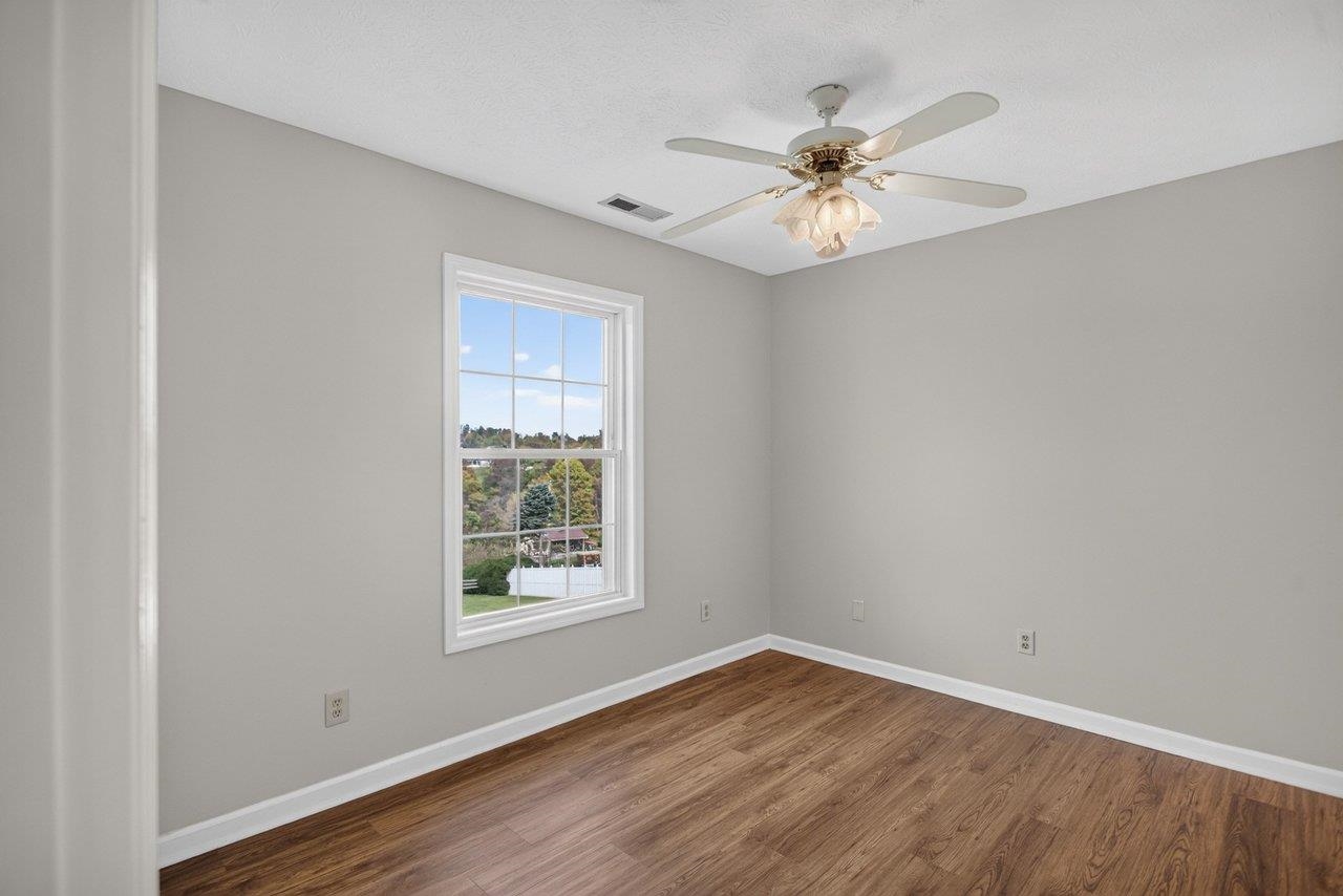 The third bedroom also offers LVP flooring and a ceiling fan. The third bedroom also offers LVP flooring and a ceiling fan.