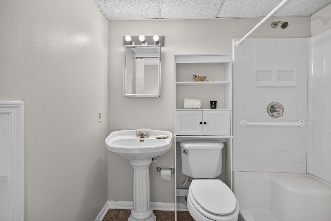 This is a nice sized bath with tile floors and a large fiberglass shower. This is a nice sized bath with tile floors and a large fiberglass shower.