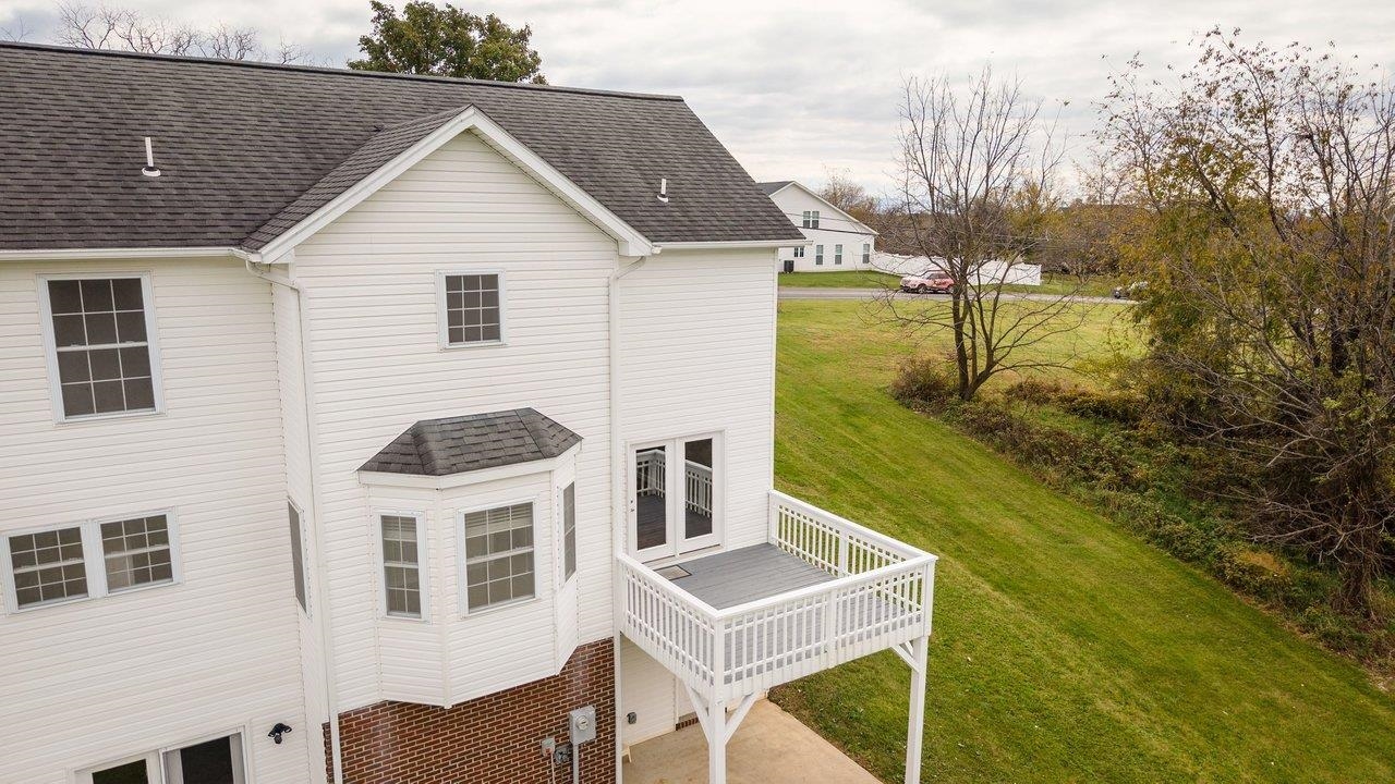 The deck is conveniently located off the living room and is perfect for grilling, relaxing, and enjoying the outdoors. The deck is conveniently located off the living room and is perfect for grilling, relaxing, and enjoying the outdoors.