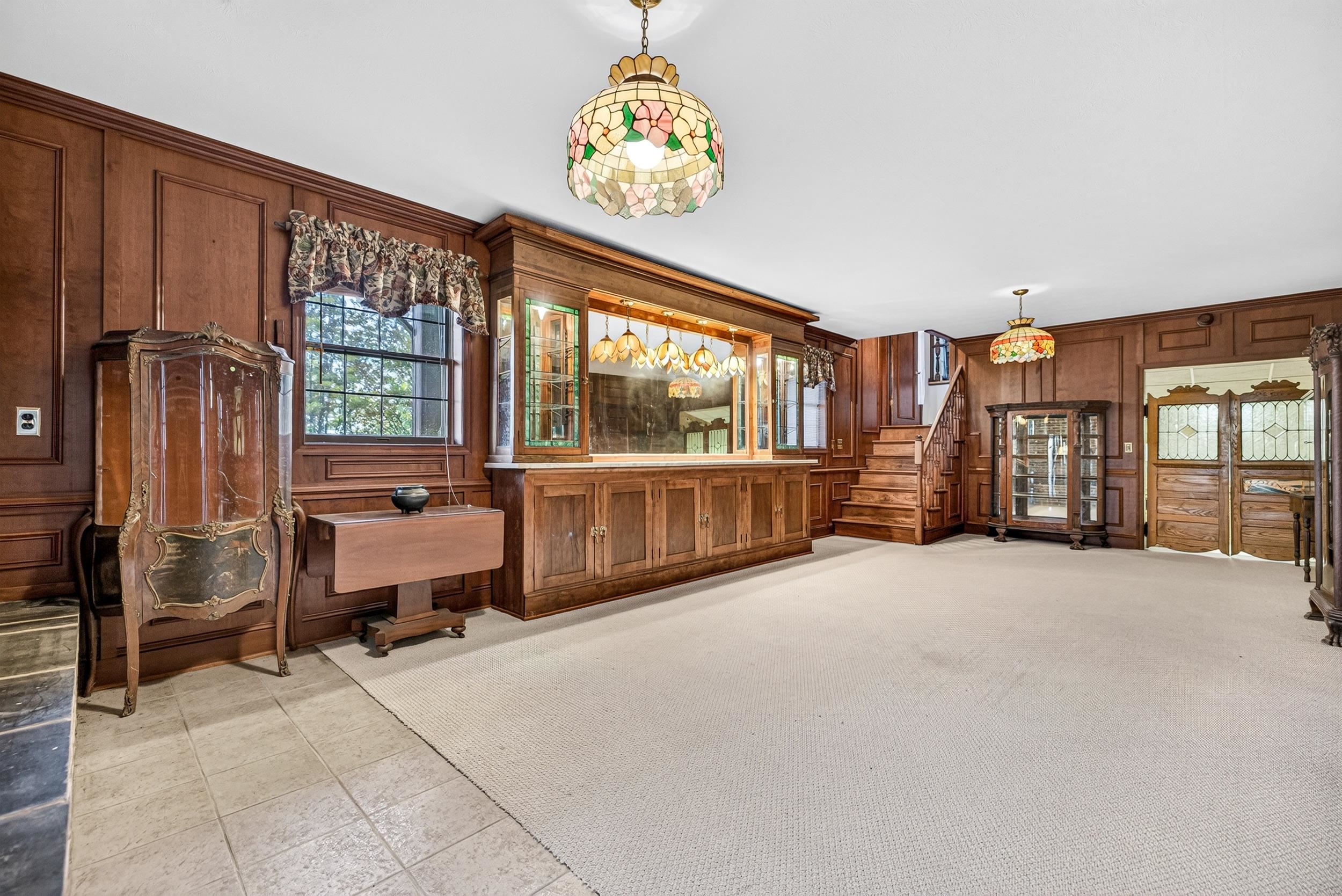 Reclaimed Pharmacy marble top mirror bar, and don't forget to check out the walk-in cedar closet!